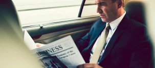 corporate account holder in black car